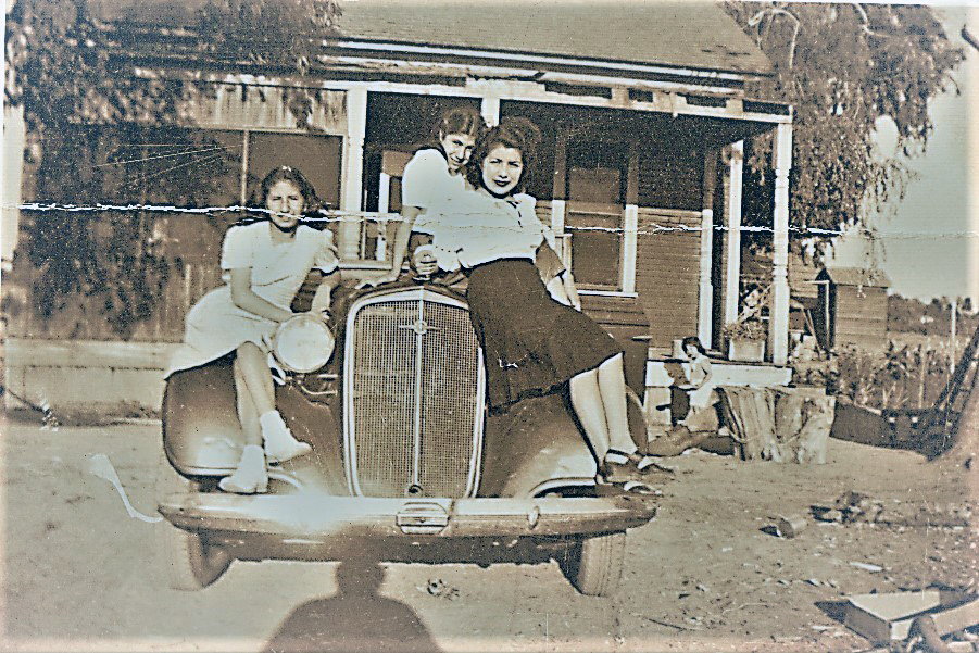 My Mom & Sisters on the car, old photo, location is Kingsberg. California.